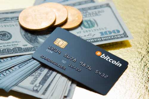 Una carta di debito per criptovalute firmata VISA e Coinbase